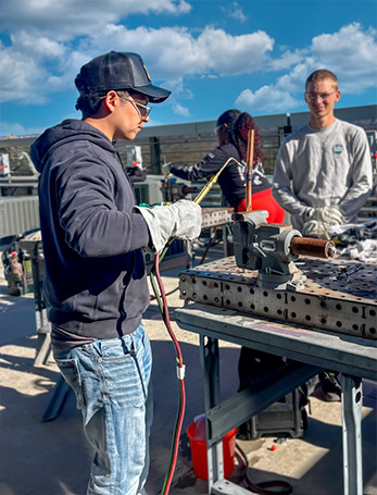 Student working in the Skilled Trades Center HVAC lab