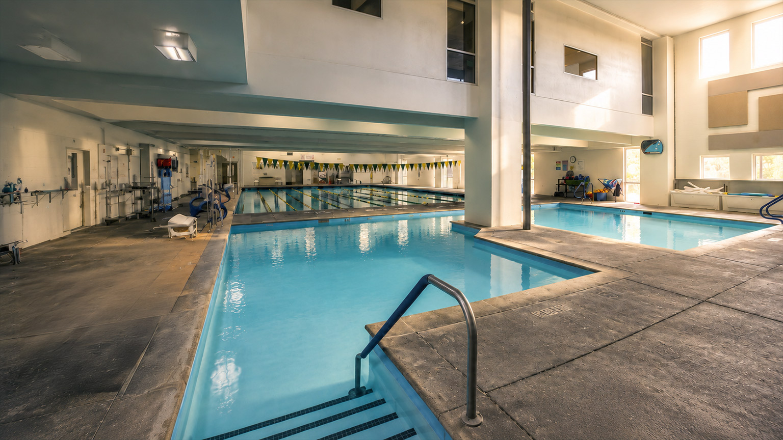 Indoor swimming pools at Yavapai College Prescott Campus with lap lanes and therapy pools.