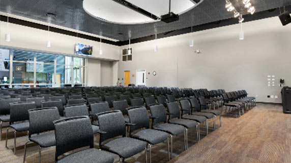 Auditorium seating and podium at the Prescott Campus